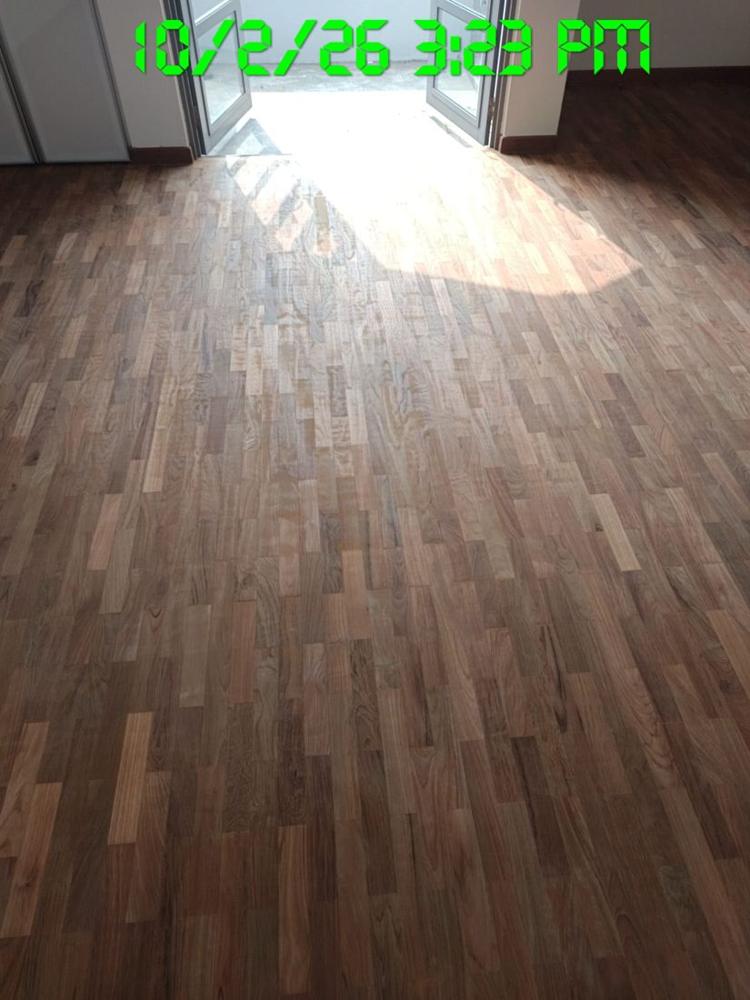 Sunlit finger parquet floor after sanding