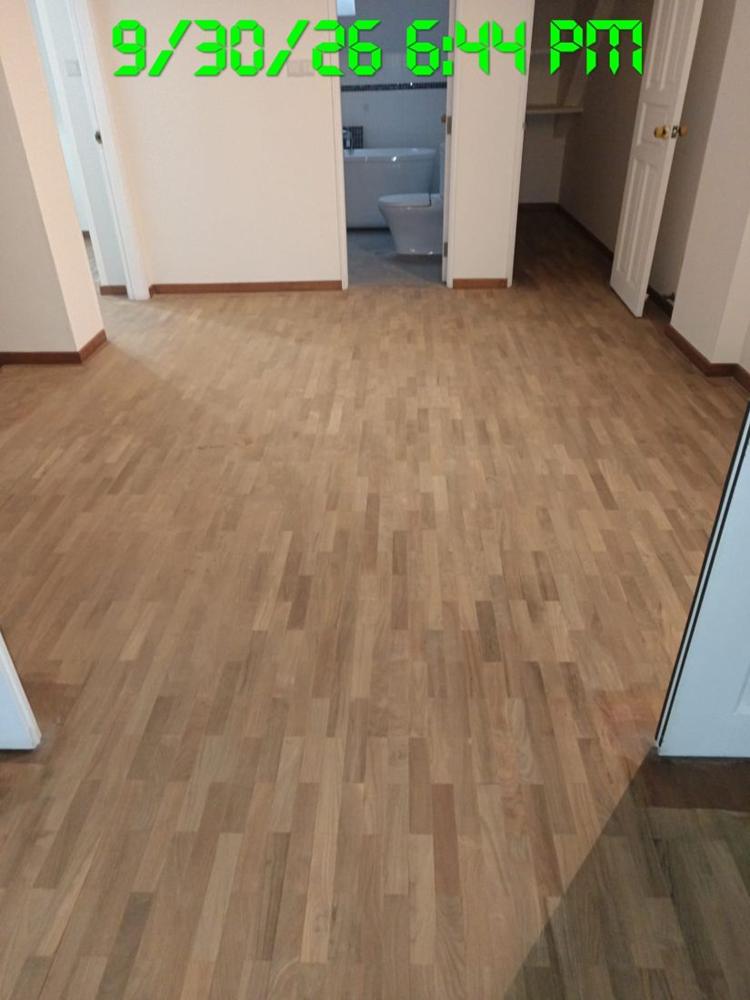 Sanded finger parquet in a bedroom with ensuite