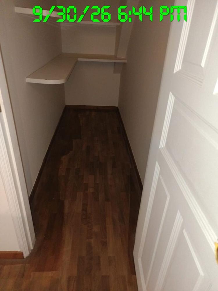 Varnished parquet in a walk-in wardrobe