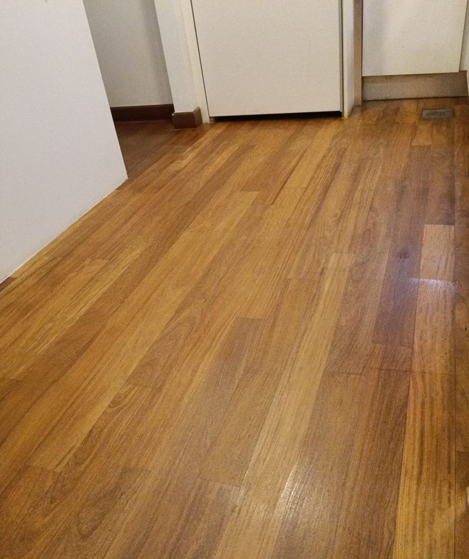 Medium-tone oak strip floor after refinishing