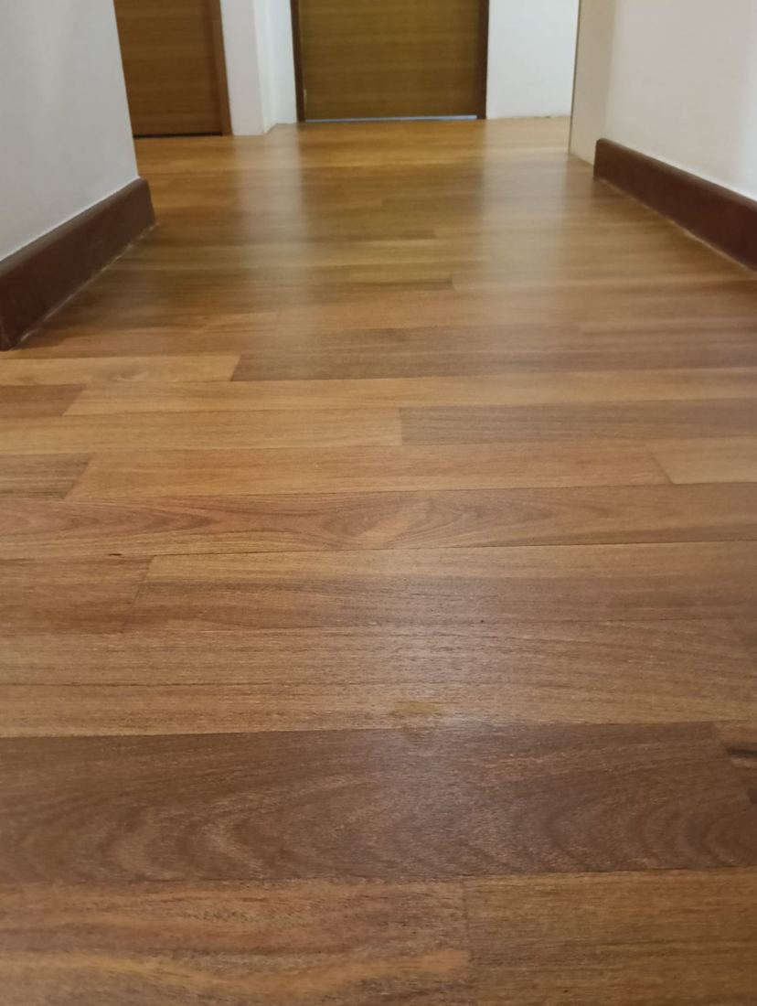 Medium oak strip floor in a hallway