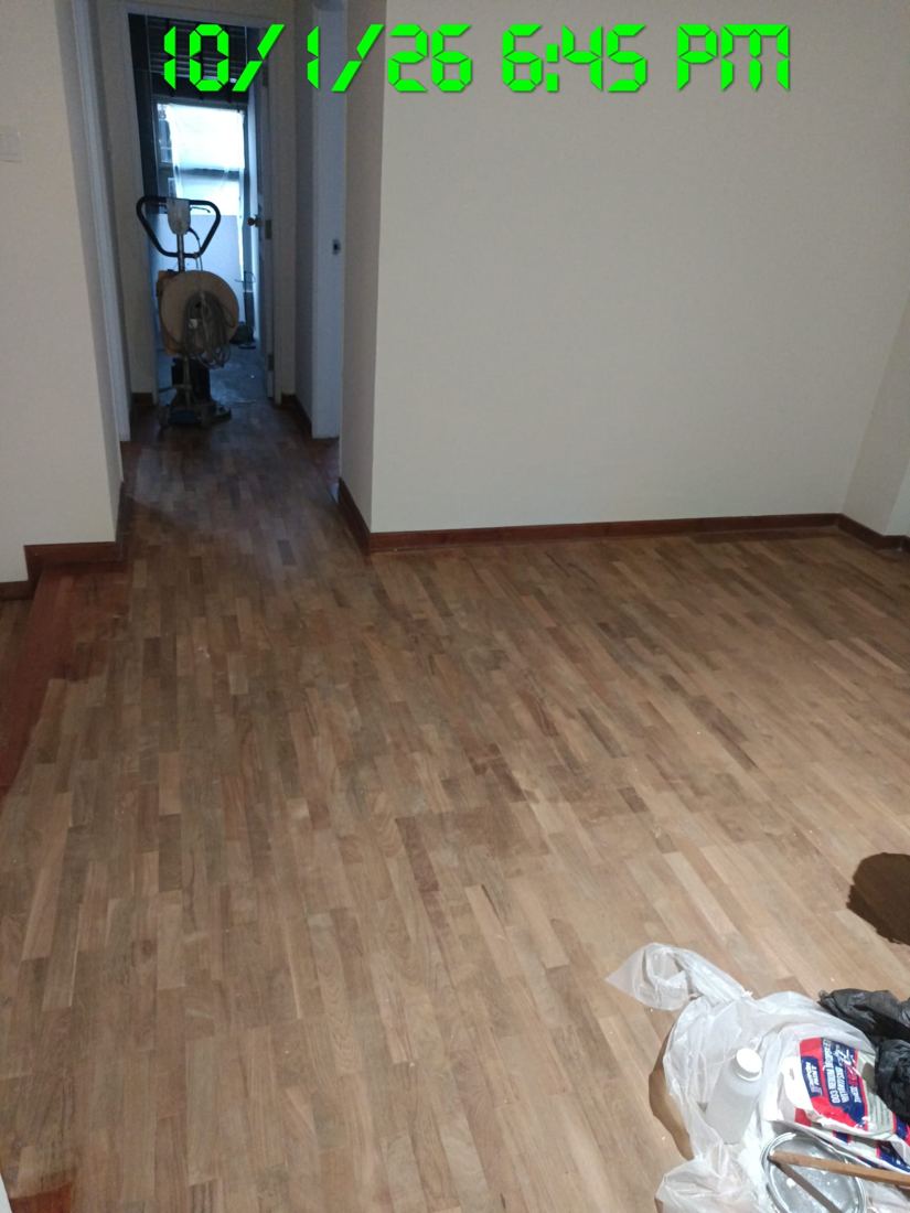 Parquet room with fan drying the sealer coat