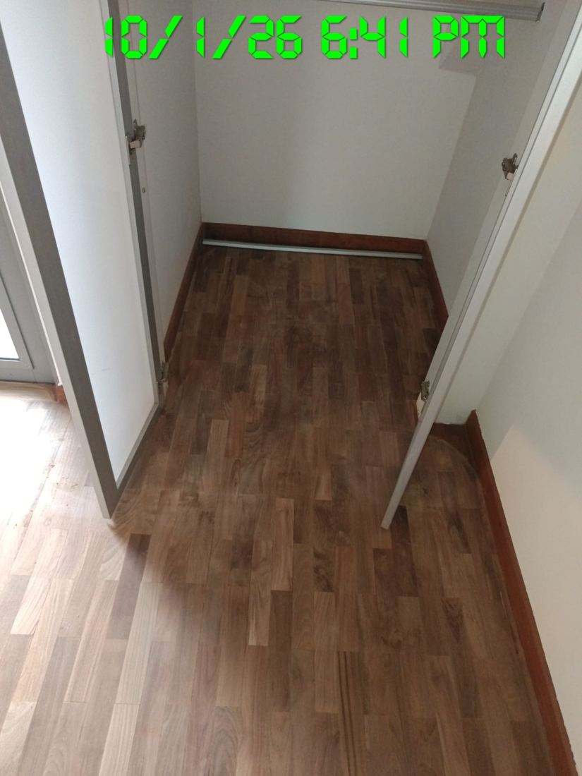 Sanded parquet in a small room
