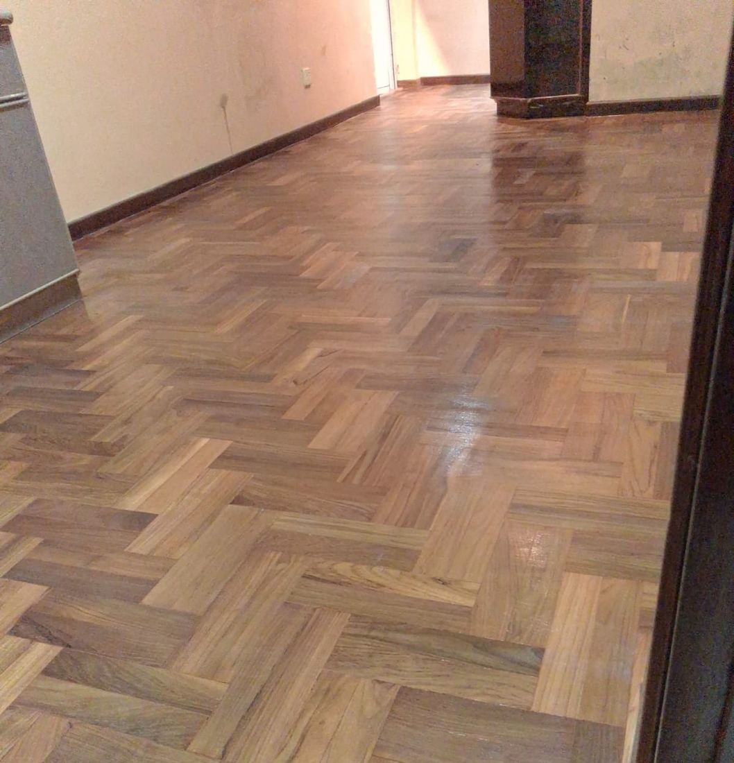 Teak herringbone parquet after restoration