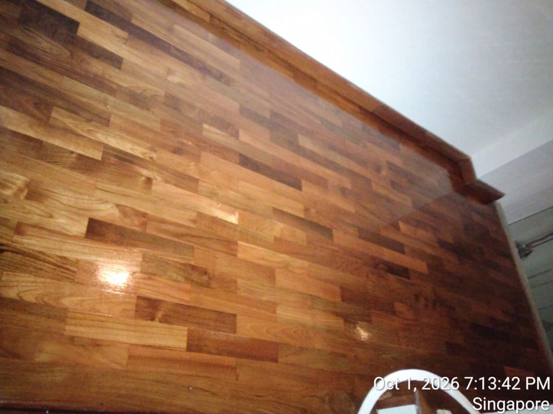 Varnished timber strip floor on an upper landing
