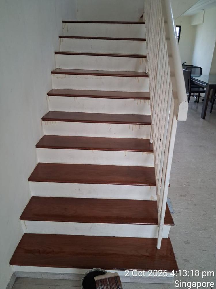 Timber stair treads with white risers after varnishing