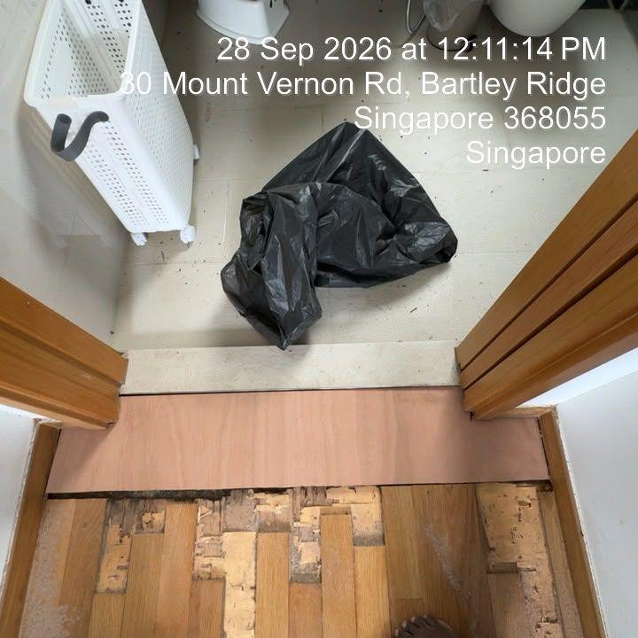 New plywood base laid where water-damaged parquet was removed